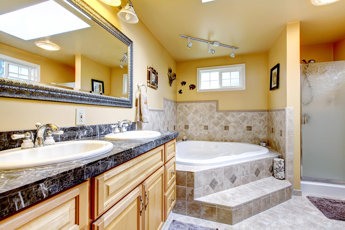 Completed bathroom renovation with updated fixtures and tile